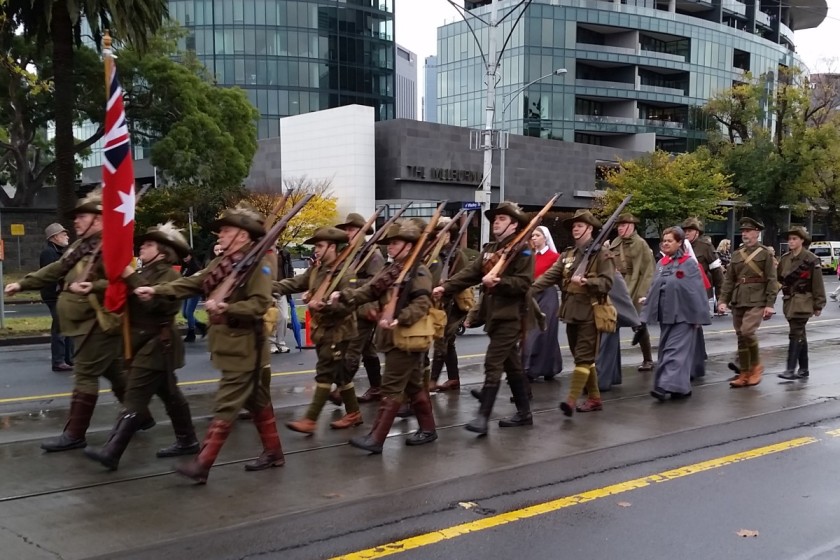 Some groups are a mixture of both, displaying the historic uniforms as they march along.