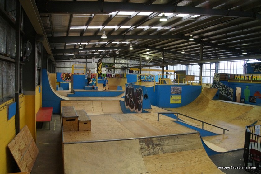 The skatepark is situated in an industrial hall and made of plywood.