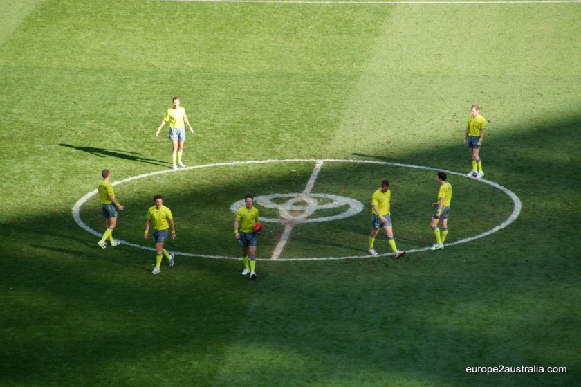 There are 7 refs in the game, easily recognizable in their yellow outfits.