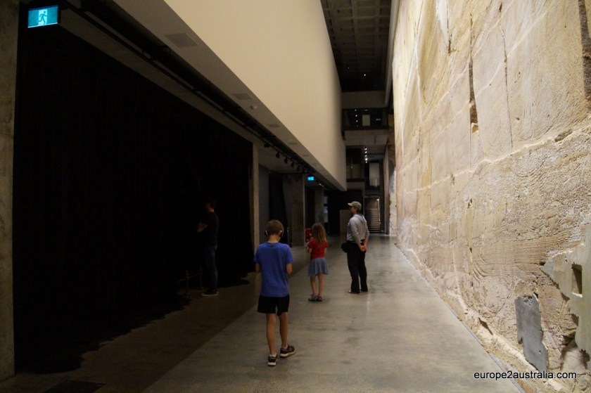 You take a lift to the the bottom and make your way back upstairs.